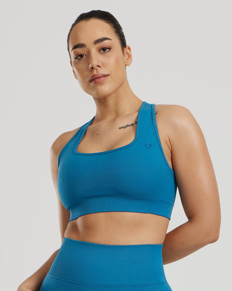 Motion Seamless Racer Back Bra - Peacock Blue | Women's Best