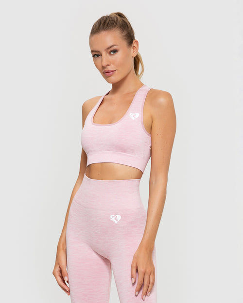 Pink ultimate leggings with matching sports bra.
