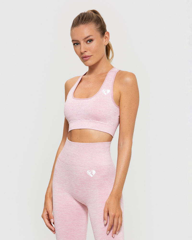 Reebok Women's Seamless Ribbed Crop Top with Removable Pads, Wirefree Cut  Out Racer Back in Pink Sports Bra