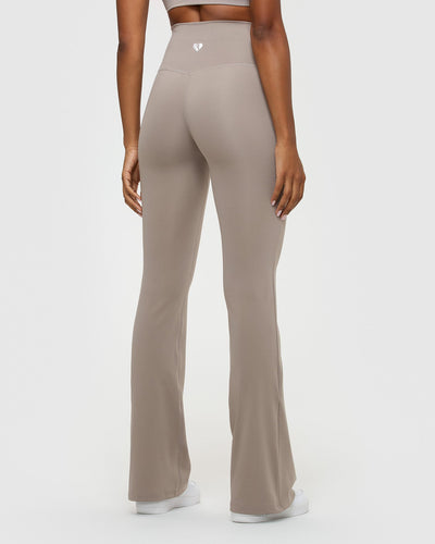 Solid color plus size high rise flare leggings. Inseam approximately 31 in  length. • High rise style waist • Flare hem • Soft and stretchy fabric •  Perfect for styling with heels