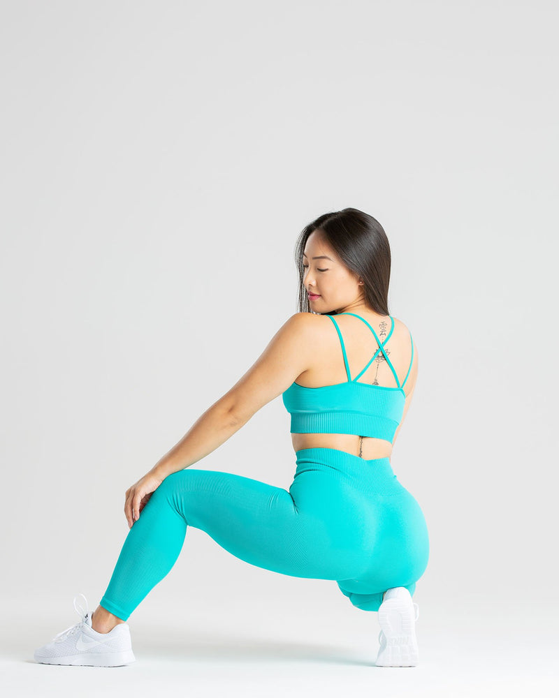 Buy Women's turquoise blue sports tight with reinforced side seams